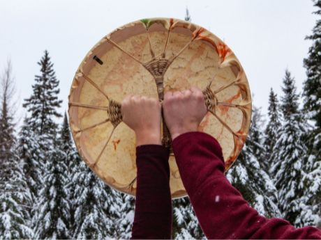 Hands holding drums